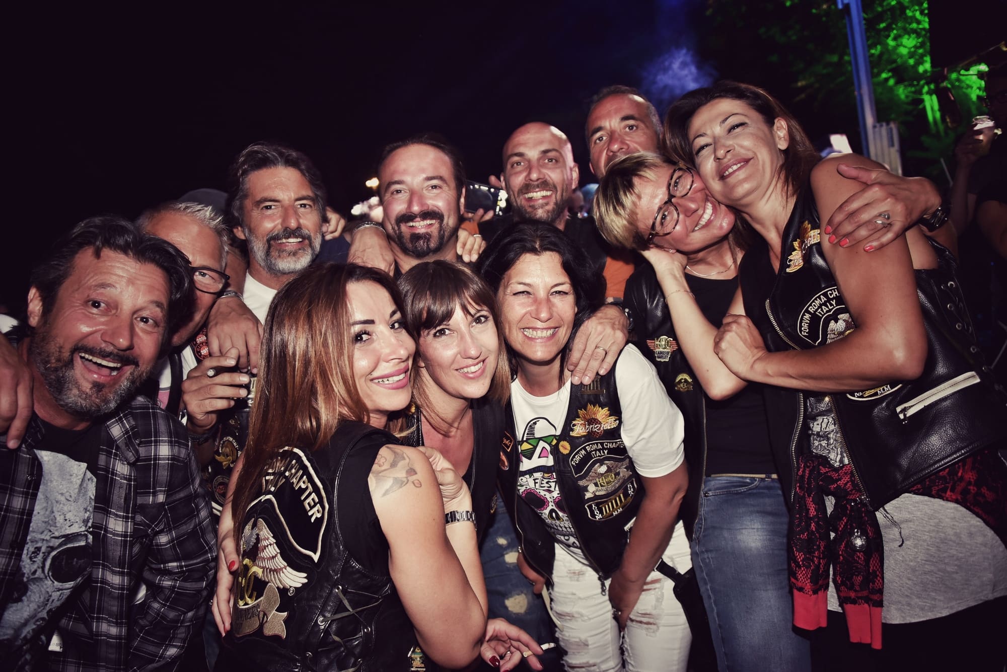 A group of bikers posing for a photo.
