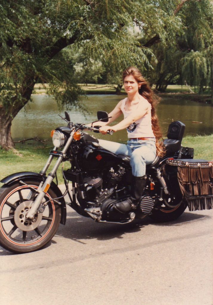Cris on a Harley-Davidson.