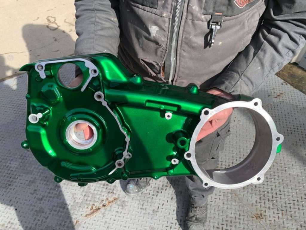 A picture of a motorcycle engine part.