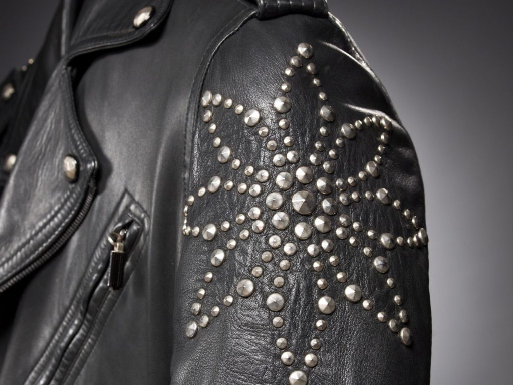 Close-up of a Versace leather jacket's sleeve.